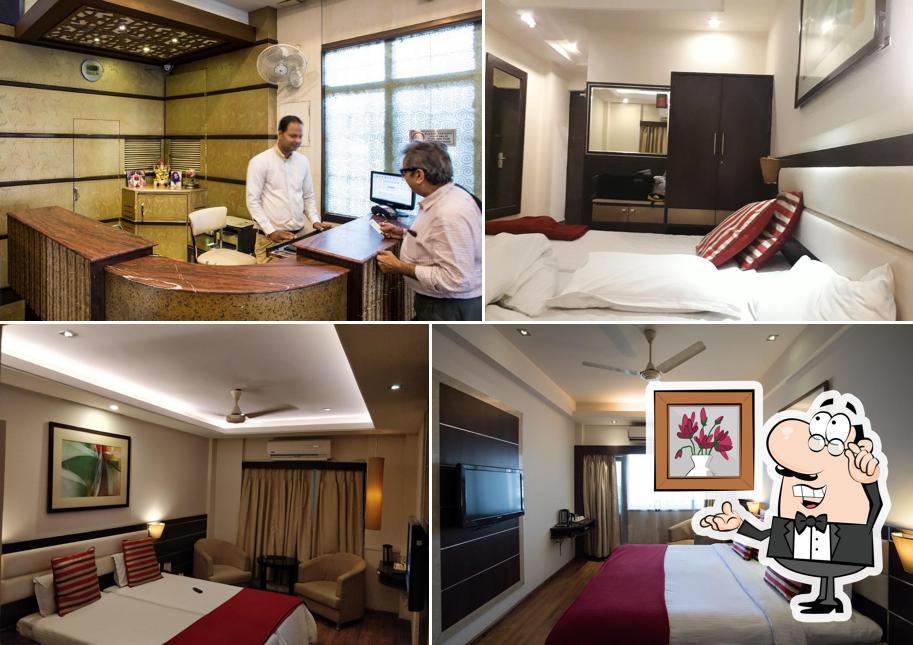 Take a seat at one of the tables at Hotel Surya Royal