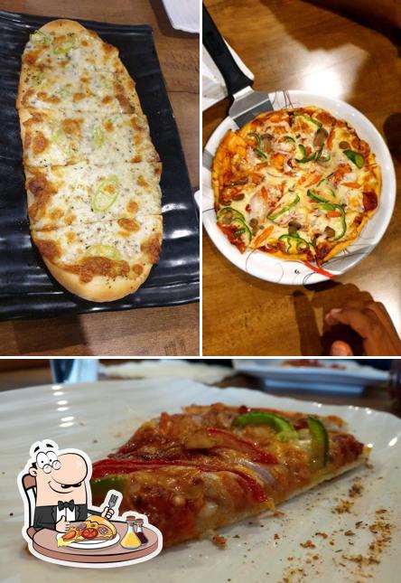 Try out pizza at Pizzaholic Woodfire Pizza