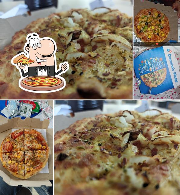 Pick pizza at Domino's Pizza Gandhi Park, Aligarh