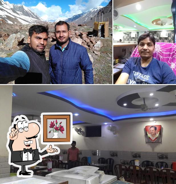 Take a look at the image showing interior and exterior at Amit Bhojnalaya family restaurant