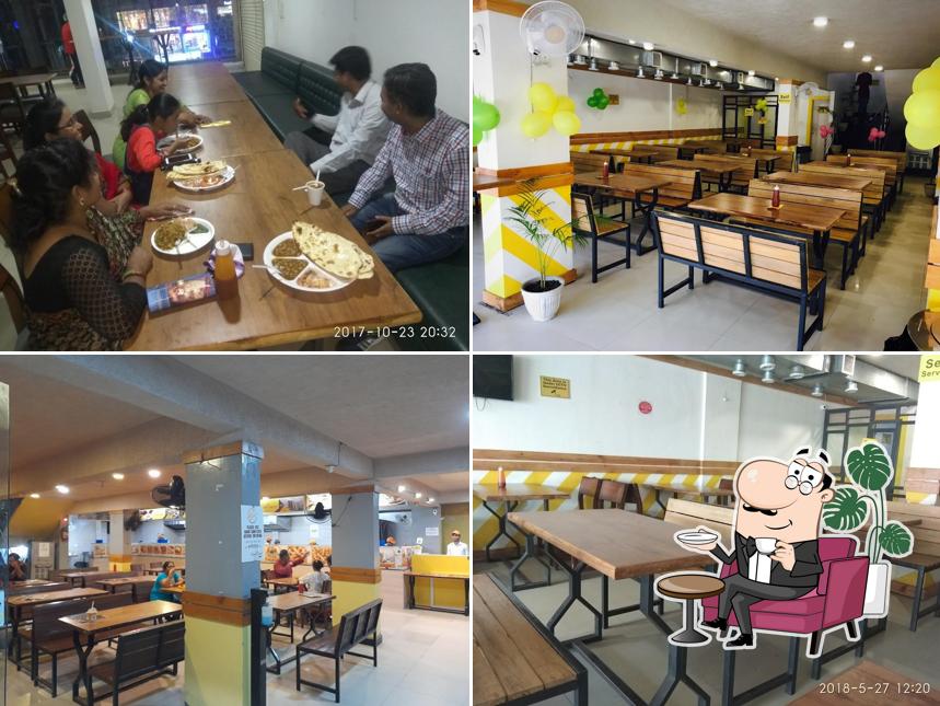 Take a seat at one of the tables at Sagar Gaire - Kolar Road