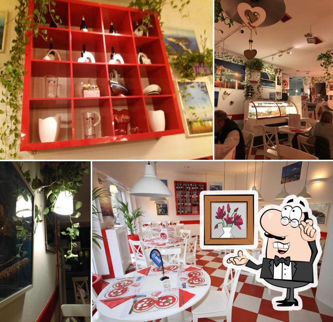 Siediti a un tavolo di Ti Amo Pizza