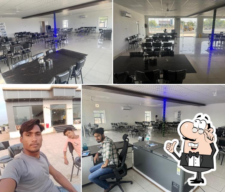 The interior of Hotel Rahul Place AC restaurant