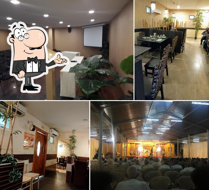 Take a seat at one of the tables at Ananda Vilas