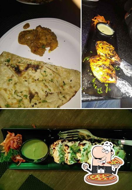 Try out pizza at PubliC The Rooftop Bar & Kitchen
