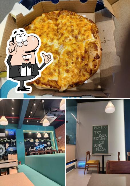 The restaurant's interior and pizza