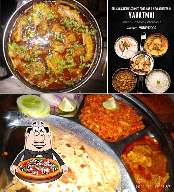Try out pizza at Suruchibhog(सुरूचिभोग) mess & tiffin servises