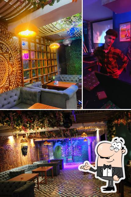 Take a seat at one of the tables at Mukti Cafe & Kitchen