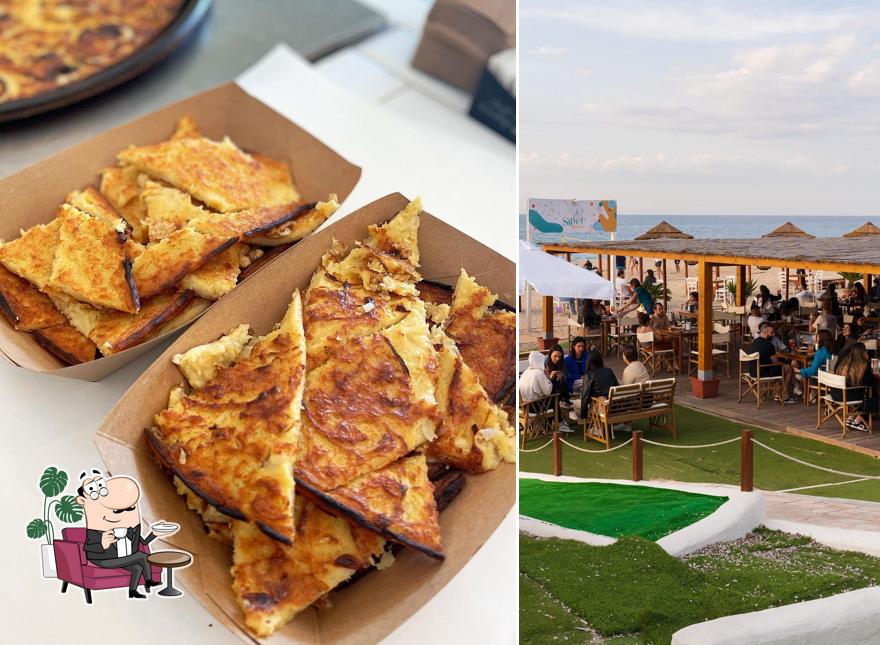 Dai un'occhiata agli interni di Pizzeria Cocco