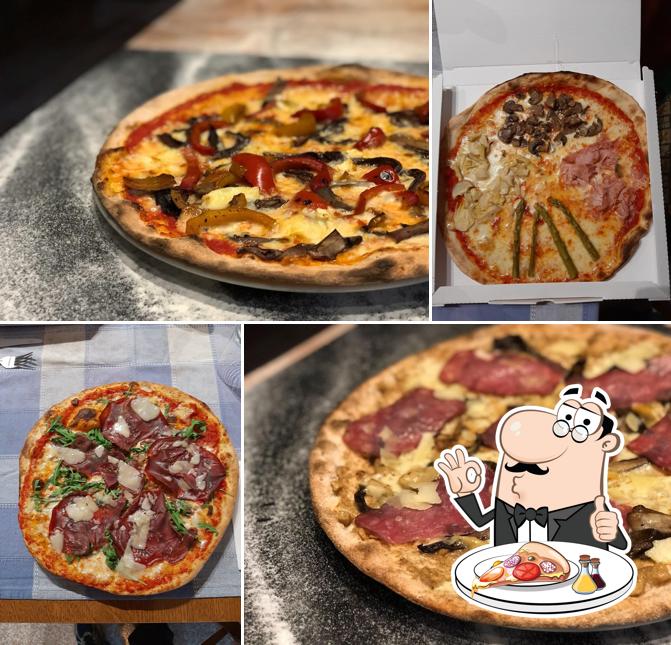 A Obiettivo Pizza Srl, puoi provare una bella pizza