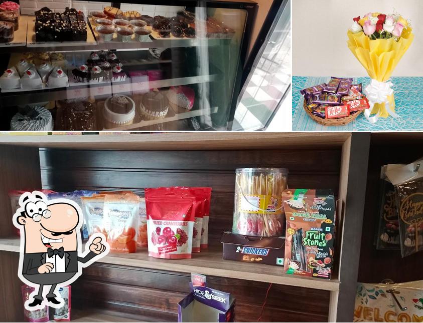 Take a seat at one of the tables at Winni Cakes & More