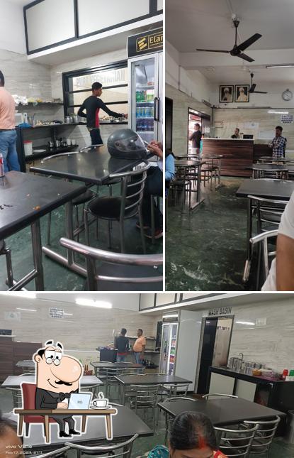 Take a seat at one of the tables at Hotel Karnail