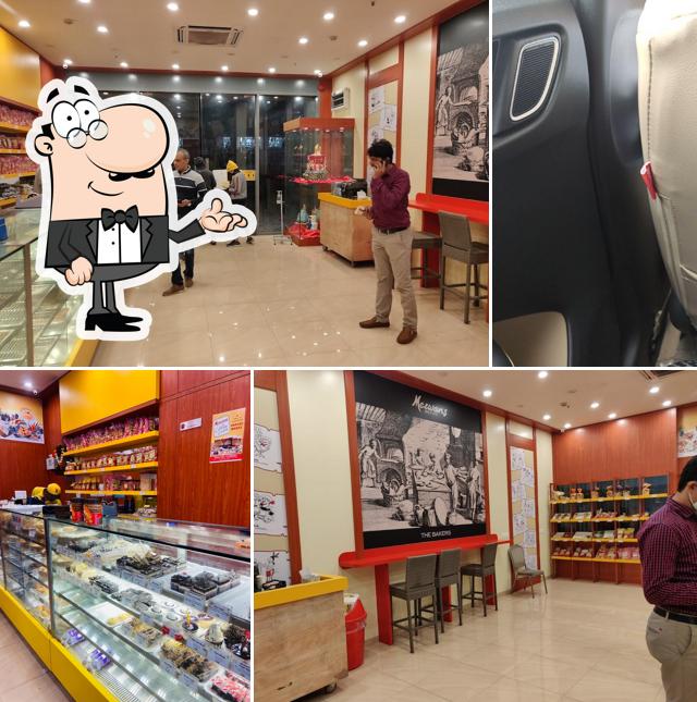 Take a seat at one of the tables at Merwans Cake Stop