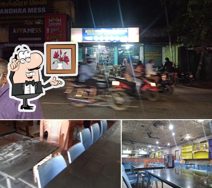 This is the photo showing interior and dining table at Nandhini Restaurant allapuram