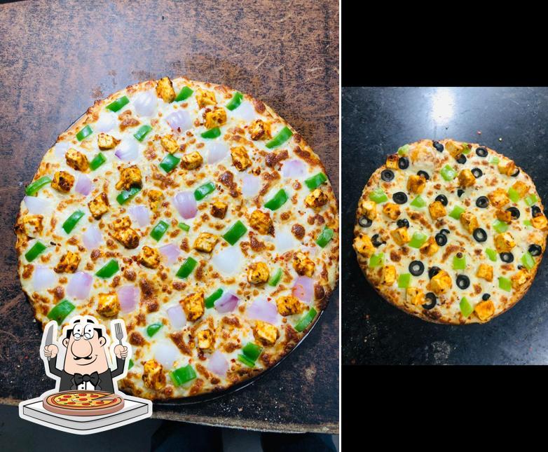 Try out pizza at Mr. Sanders Island