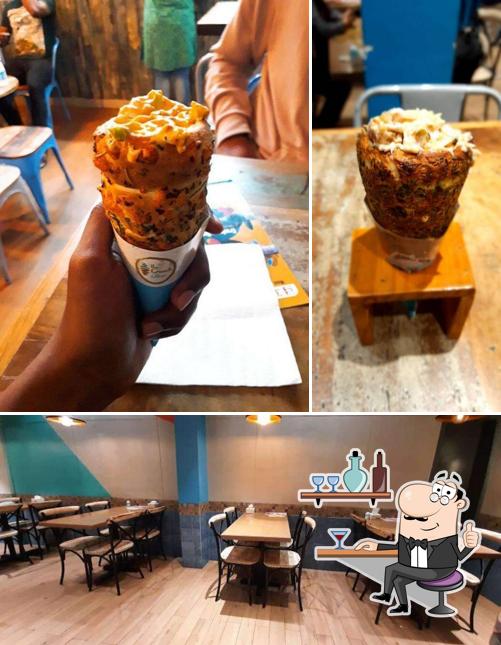 Take a seat at one of the tables at The Crunch Affair Cafe & Bistro