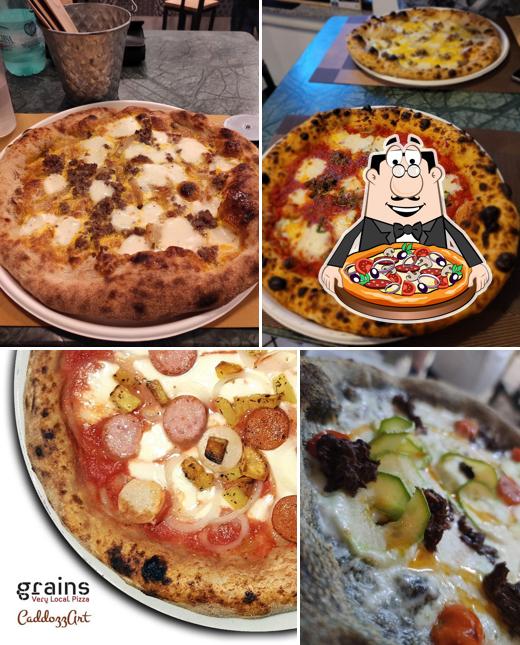 Prenditi una pizza a Grains Pizzeria Pub