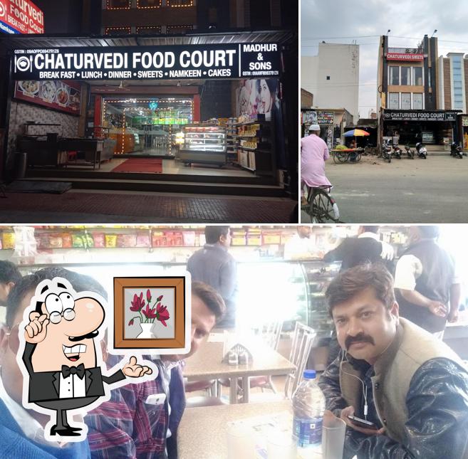 Take a seat at one of the tables at Chaturvedi Food Court, Uttar Pradesh