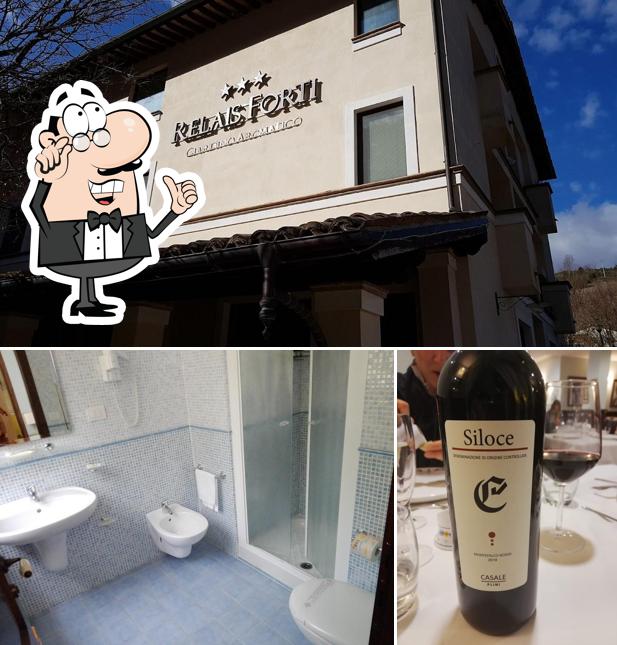 La foto della interni e vino di Relais Forti