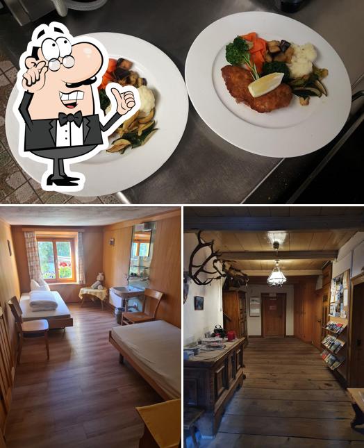 Questa è la foto che presenta la interni e cibo di Pension Arina