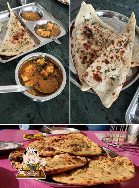 Pick pizza at RASOI DHABA