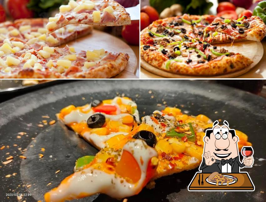 Pick pizza at PIZZA ZONE, KALOL