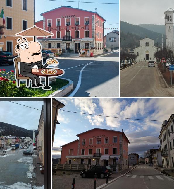 Puoi goderti l'aria fresca da seduto all'esterno di Trattoria La Speranza