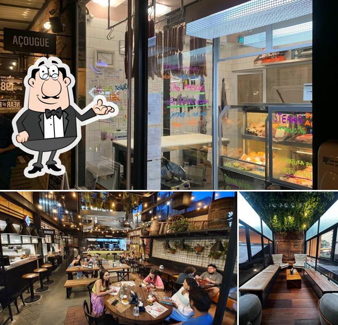 Sente em uma das mesas no Bark & Crust
