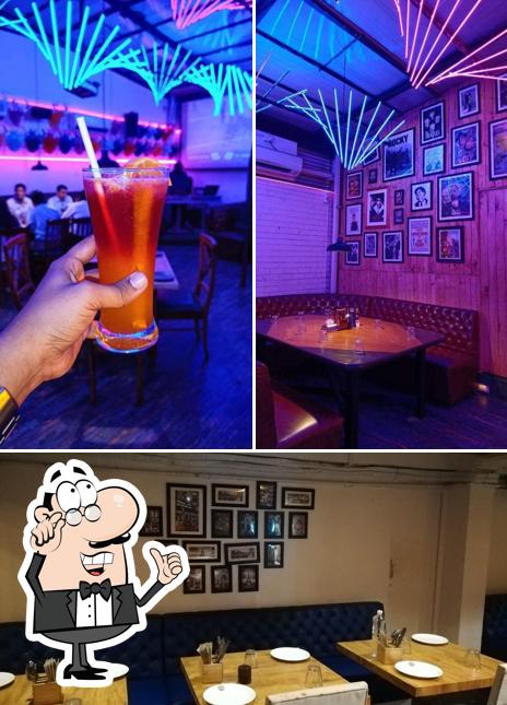 Take a seat at one of the tables at Fusion Ville