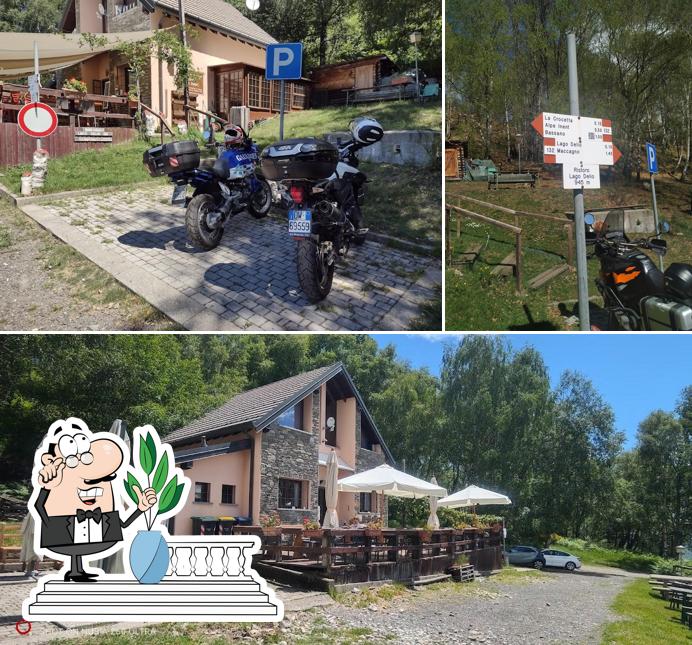 Puoi goderti l'aria fresca da seduto all'esterno di Ristoro Lago Delio