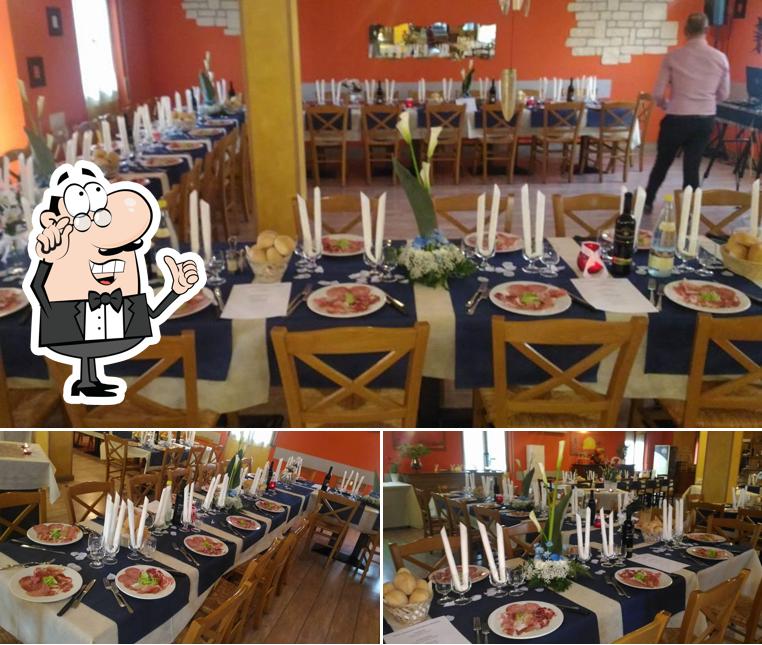 Siediti a un tavolo di Ristorante Pizzeria La Fattoria