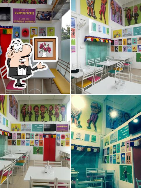 Take a seat at one of the tables at D' Hungry Mogambo