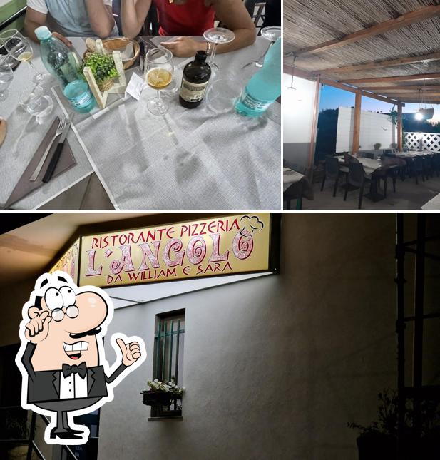 Siediti a un tavolo di Pizzeria Ristorante L'angolo