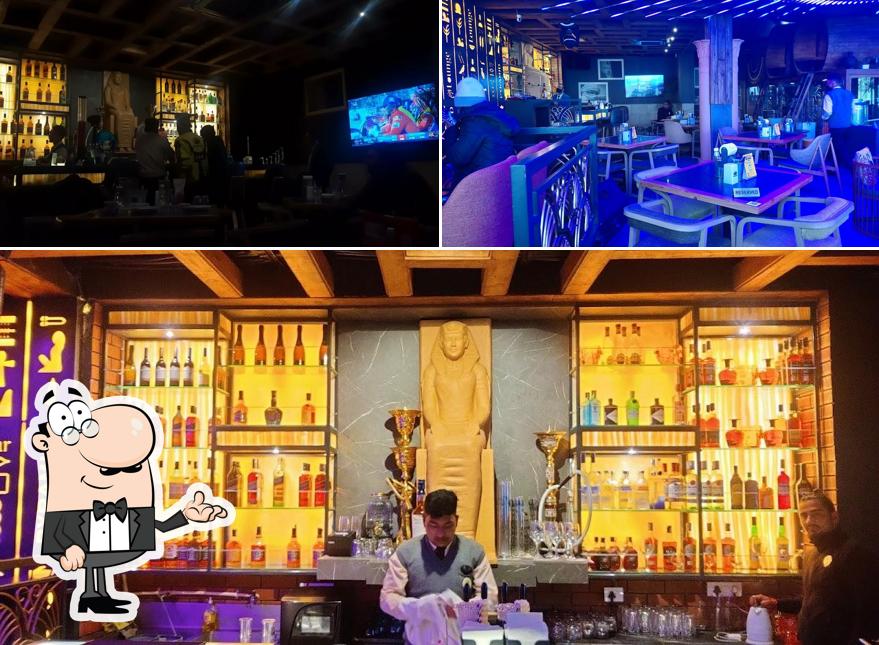 Take a seat at one of the tables at Pyramid Shimla Cafe Lounge Bar Microbrewery Nightclub Restaurant Take a seat at one of the tables at Pyramid Shimla Cafe Lounge Bar Microbrewery Nightclub Restaurant