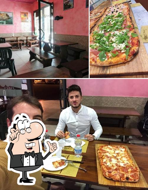 La immagine di interni e pizza da Pizza e Sfizi dallo Scarfa