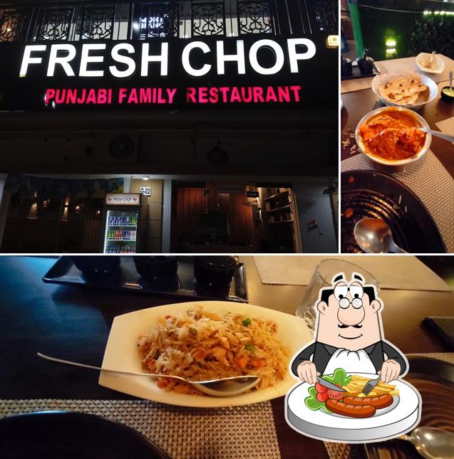 The photo of food and exterior at Tandur restaurant by Tushar foods
