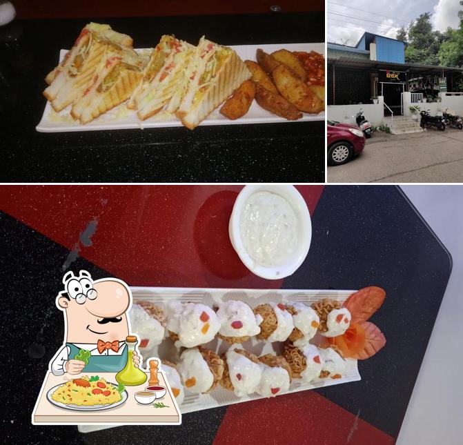 The picture of food and exterior at Dhairyam Pure
