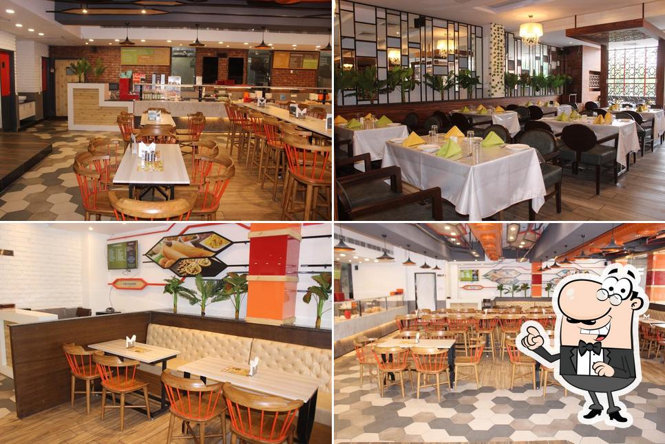 The interior of Five Star Janta Aura Restaurant
