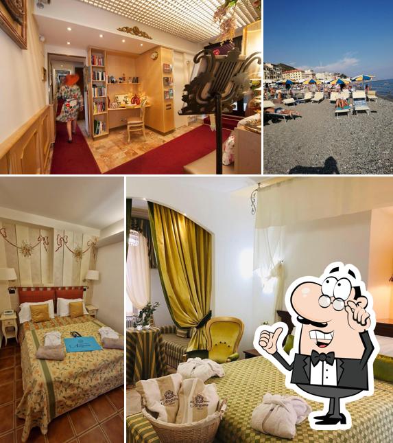 Siediti a un tavolo di Hotel Astigiana