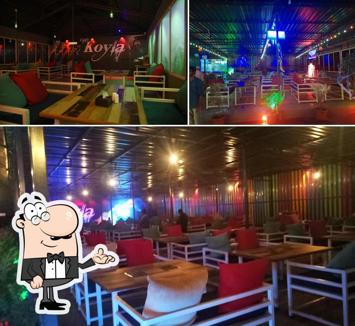 Take a seat at one of the tables at Cafe Koyla