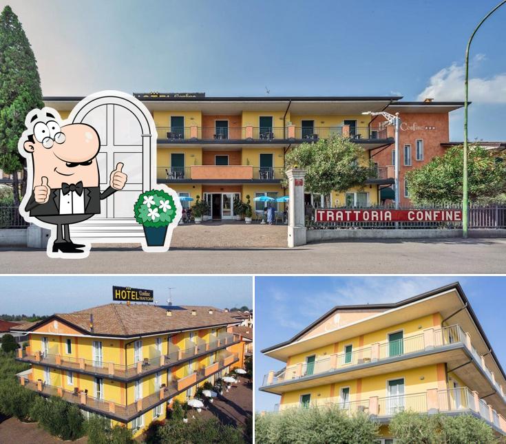 Puoi goderti l'aria fresca da seduto all'esterno di Hotel Trattoria Confine