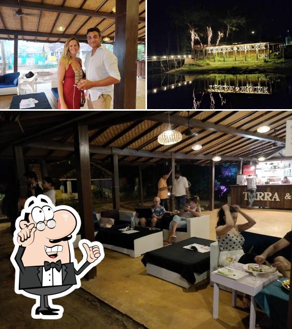 Take a look at the image showing interior and exterior at Terra & Mare Beach bar & Kitchen