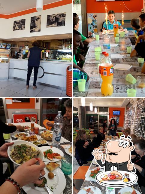 Prenditi una pizza a Pizzeria Rugantino