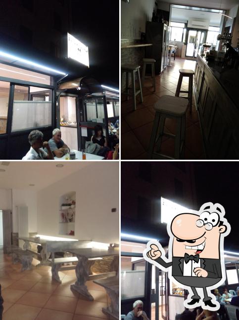 Dai un'occhiata agli interni di Rewind Bar Pub Wine Bar Paninoteca