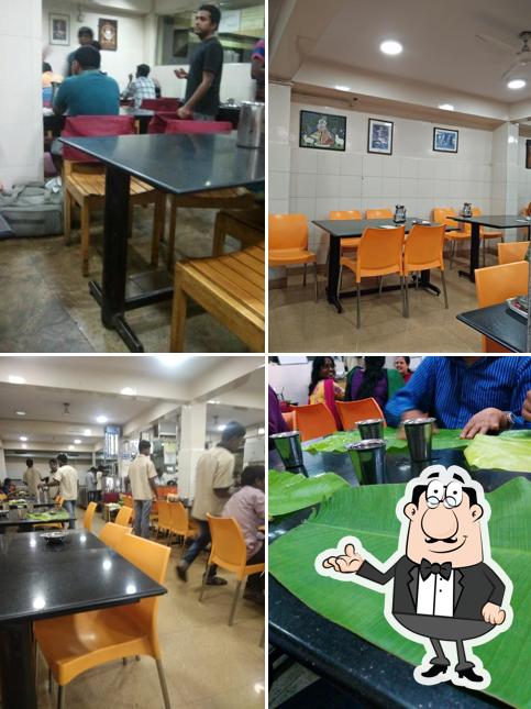 Take a seat at one of the tables at Sree Krishna Kafe