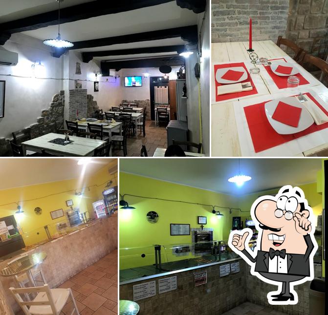 Gli interni di PIZZERIA MONDO PIZZA AL TAGLIO E AL TAVOLO DI MARTINI ROBERTO