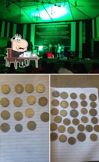 Take a seat at one of the tables at Poong Nest Restaurant Cum Bar