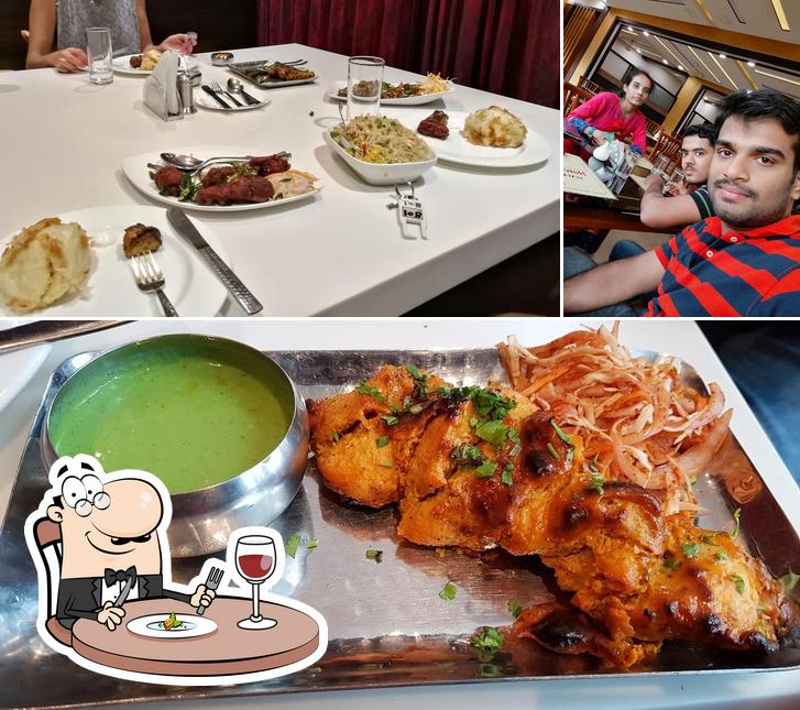 The image of food and bar counter at Royal Atithya