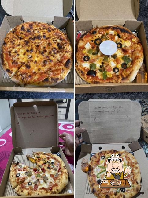 Get pizza at Bakeyard Pizza