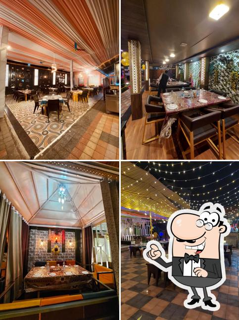 Take a seat at one of the tables at DASTARKHWAN RESTAURANT